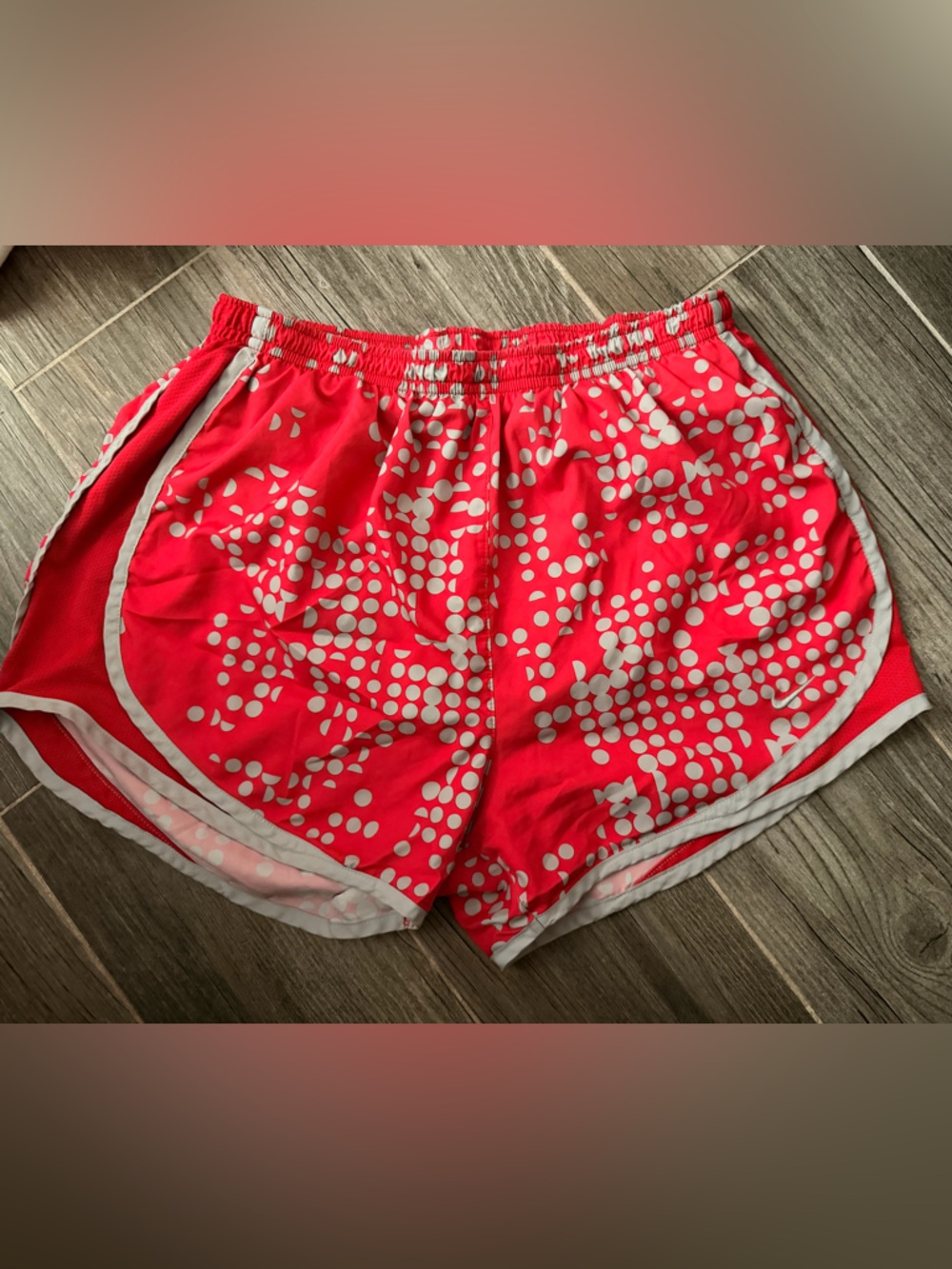 Nike Women's Red Athletic Shorts with White Dot Pattern